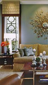 Decorate With The Iconic Sunburst Mirror Gold Living Room Gold Living Room Decor Silver Living Room