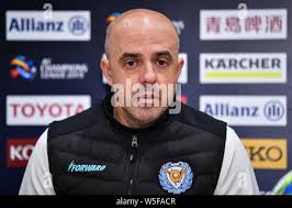 Head coach Andre Luiz Alves Santos, shortly Andre, left, and Brazilian  football player Edgar Bruno da Silva of South Korea's Daegu FC attend a  press c Stock Photo
