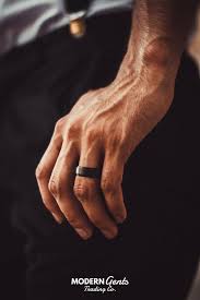 No Man Is Complete Without This Timeless Tungsten Ring This Matte Black Wedding Band Is Jus Black Wedding Band Mens Wedding Bands Engagement Ring Wedding Band