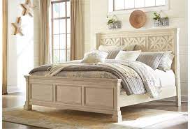 This bedroom set features 1 king size bed with paneling and wood overlay accents on the tall headboard, 1 mirror, and 1 dresser with 9 spacious drawers to keep belongings. Signature Design By Ashley Bolanburg 519277049 King Panel Bed With Lattice Panels Beck S Furniture Panel Beds