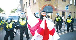 New Age | New clashes outside London hotel housing migrants