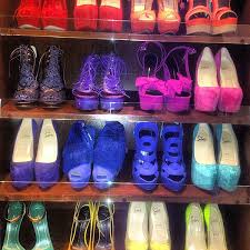 It's no secret kim kardashian loves fashion and in a recent photo on instagram, she showed off a simple look with a lot of pricey items behind her! Kim Kardashian S Incredible Shoe Closet Ysls Guccis And Louboutins