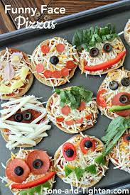 Funny Face Pizzas On Http Tone And Tighten Com A Fun Way To Get Your Kids Involved In Making Dinner And To Hel Fun Kids Food Kid Friendly Meals Happy Foods