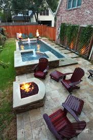 Many homeowners with smaller backyards balk at the idea of getting a pool because they either think it will take up the entire yard, or that such a tiny pool will look funny. Awesome Narrow Pool With Hot Tub And Firepit Small Backyard Pools Backyard Patio Backyard