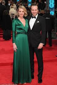 Ex Hollyoaks Star Elize Du Toit Joins Rafe Spall At Baftas Emerald Green Gown Green Gown Bridesmaid Dresses