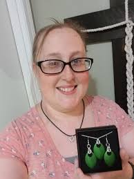 Resin art pieces turned into chainmail keychains