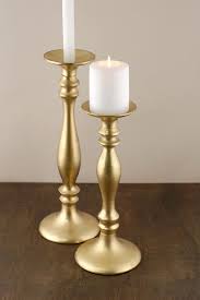 Three tall gilt candle holders. Gold Pillar Candle Holders Wholesale Online Discount Shop For Electronics Apparel Toys Books Games Computers Shoes Jewelry Watches Baby Products Sports Outdoors Office Products Bed Bath Furniture Tools Hardware