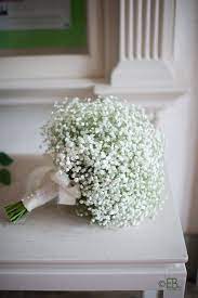 Lightly fragrant calla lilies represent magnificent beauty, and are perfect and in season for spring and summer weddings (it is a tropical flower that a lush, cascading ranunculus bouquet will say, in the language of flowers, i am dazzled by your charms. perfect for walking down the aisle to your partner. Flower Arrangements Wedding Simple Babies Breath Flower Bouquet Wedding Simple Wedding Bouquets Wedding Flower Arrangements