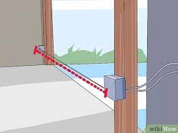 Loosen the wing nut on the front of the sensor, align the sensor so their lenses are pointing at each other. How To Align Garage Door Sensors 9 Steps With Pictures