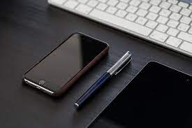 ↑↑tap and get the free app! Black Iphone On Black Office Desk Business Clean Black Iphone On Desk 910x607 Wallpaper Teahub Io