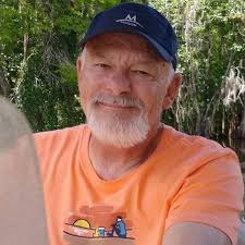 On this day in 1988 the late great Roy Buchanan died suddenly! Pictured at  his tombstone is Roy's beautiful daughter Jenny Buchanan! Jenny is also the  young girl Roy is holding on