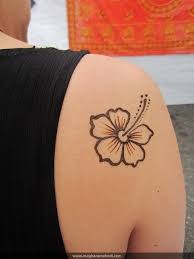 It combines the sacred hindu symbols of eternity, divinity, and purity to create a beautiful final look. Plumeria Henna Tattoo Hand Henna Flower Designs Henna Tattoo Designs Simple