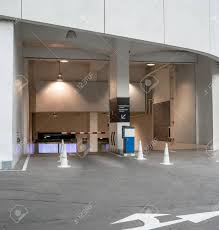Underground parking may be utilized to reduce the overall height of a parking facility or take advantage of site topography. Entrance To Underground Parking Lot With Advertising Area Mock Stock Photo Picture And Royalty Free Image Image 107388766
