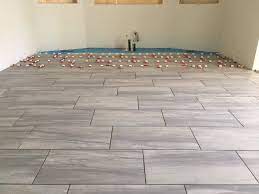 It is for a shower wall and i would like to keep the joints as small as possible. 1 3 Staggered Tile Pattern Tile Patterns Patterned Floor Tiles 12x24 Tile Patterns