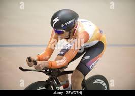 Evelyn Stevens sets a new UCI hour world record of 47.980 km. Shown with  USA Cycling's Bob Stapleton (L) and CEO Derek Bouchard Hall (R) *** Please  Use Credit from Credit Field *** Stock Photo