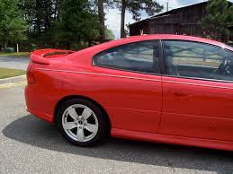 Image result for Medium Red 2004 Pontiac