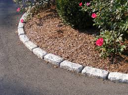 Choose from concrete pavers, brick pavers, natural stone or river rock. Driveway Edging Standard Cobblestones Used As Walkway And Planter Bed Edging Driveway Edging Garden Edging Stones Lawn Edging