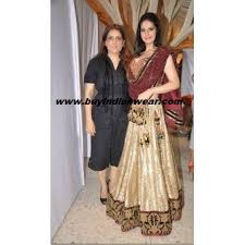 165 Zarine Khan Golden Maroon Lehenga With Free Shipping Offer Worldwide With Images Bollywood Lehenga Lehenga Fashion