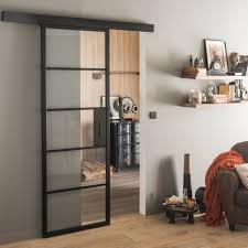 Un système de blocage est prévu. Porte Atelier Coulissante Au Meilleur Prix Leroy Merlin