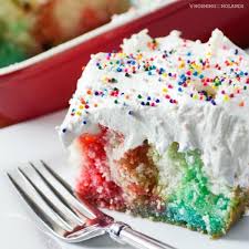 This isn't the first poke cake we've made, see our watermelon poke cupcakes , banana pudding poke cake , and boston cream poke cake to name some of our favorites. Rainbow Birthday Poke Cake