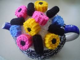 Sunny days and sizzling looks are here again! Hand Knitted Teapot Cozy Tea Cosy With Liquorice Allsort Sweets Tea Cosy Knitted Tea Cosies Knit Tea Cozy