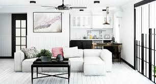 New york city designer young huh recommends adding in graphic curtains and a surprising piece of furniture, like this floating wood table, to create an unusual, yet stunning. Classic And Chic Black And White Living Room Decor Decorilla Online