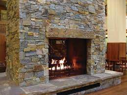 Building an outdoor stone fireplace is a great way to utilize your personal space during the cold winter months. Pin By Shelbs Hamilton On Prairifire Natural Stone Fireplaces Indoor Fireplace Ledge Stone Fireplace