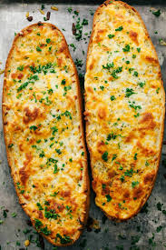 Cheesy Garlic Bread Is So Simple To Make With Loads Of Cheese And That Soft Bread On The Inside W In 2020 Cheesy Garlic Bread Garlic Bread Recipe Homemade Garlic Bread