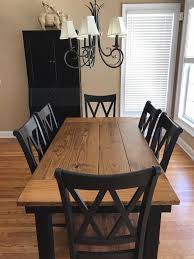 This set features a round dining table and four dining chairs. Farmhouse Table Customizable Etsy Schlafzimmer Wohnzimmer Hausdekoration Einrichten W Wood Dining Room Wood Dining Room Set Farmhouse Dining Rooms Decor
