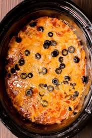 Slow Cooker Chicken Enchilada Casserole The Magical Slow Cooker Recipe Crockpot Recipes Slow Cooker Recipes Easy Slow Cooker Recipes