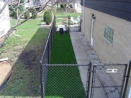 Dog Run Good Place To Keep Pet When Guests Visit When Owners Aren T Home Synthetic Turf Can Be Hosed Down For Easy Clean U Dog Runs Dog Kennel Outdoor