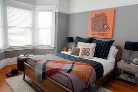 Transitional Bachelor Pad Bedroom With Orange Accents Bachelor Pad Bedroom Bachelor Bedroom Bachelor Pad Decor