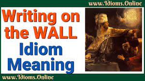 Mene, mene, tekel, parsin, is an aramaic phrase found in chapter five of the book of daniel , the story of belshazzar and the handwriting on the wall. Writing On The Wall Idioms Online