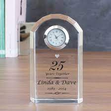 Crafted out of crystal, this beautiful clock features the words 'silver anniversary' on its front, making it an excellent gift for a silver wedding anniversary, despite it being made out of crystal rather than metal. Personalised Silver Wedding Anniversary Clock Find Me A Gift