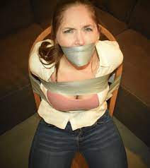 Bonded Ropes on X: I don't think @rachel_adams2 was happy with the  situation she was caught in! She's nice and snug with some tight tape and  secured to the chair, with a