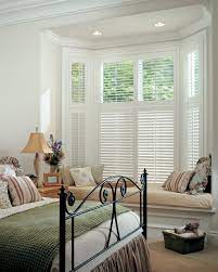 Bay window shutter cost examples: White Plantation Shutters In Bay Window Klassisch Modern Schlafzimmer Austin Von Deco Window Fashions Houzz