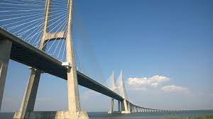 Informação de confiança disponível em várias plataformas. Portugal Friends The Vasco Da Gama Bridge Portuguese Ponte Vasco Da Gama Is A Cable Stayed Bridge Flanked By Viaducts And Rangeviews That Spans The Tagus River In Parque Das Nacoes In