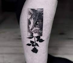 Black cat with cat paw prints tattoos with flowers on arm. Cat And Flower Tattoo By Victor Del Fueyo Post 25358