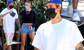 Justin thomas apologizes for using homophobic slur after missing putt. Justin Bieber Supports Pal Kanye West By Wearing Yeezy Foam Rnnr Shoe For La Lunch With Wife Hailey Daily Mail Online