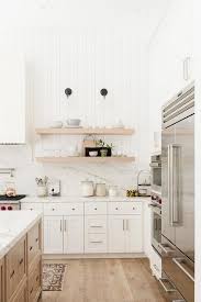 .good wall), but it got too long for one post, so we'll focus on the shiplap backsplash installation for we completely redid the kitchen, and other than just a few small things that continually bugged me. Vertical Shiplap Walls In A Transitional Kitchen Above White Marble Backsplash And White Quartz Countertop Lake House Kitchen Home Decor Kitchen Kitchen Design