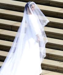 The bride, meghan markle, is american and previously worked as an actress. Royal Wedding 2018 Meghan Markle S Givenchy Dress In Detail Bbc News