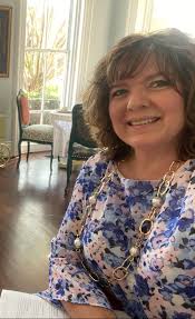 Who can help create a logo?