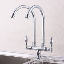 Designed to last a lifetime, this sturdy faucet is finely. Vintage Rotatable Double Faucet Bridge Kitchen Faucet