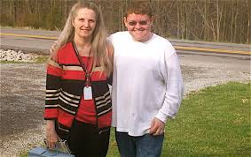 Timmy Kerns with teacher, Judy Reliford