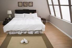 Place the bed skirt over the slats just as you would place a flat sheet onto your mattress. How To Use A Bedskirt On A Bed With Slats