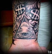 In addition a particular design or symbol may have a personal meaning. Money Tat Kevin Money Tattoo Money Sign Tattoo Sleeve Tattoos