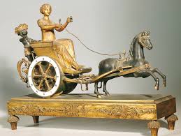 Pendule Au Char Dite Allegorie De La Louisiane Bronze Dore Patine Cadran Emaille A Paris Epoque Empire 34 X 46 X 13 Cm Orologio