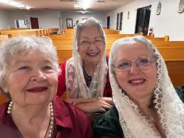 Who wears a veil to mass. Let me see your pics. My friends & I at mass..