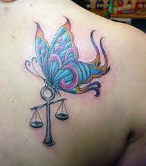 30 Cool Libra Tattoo Designs Hative Libra Scale Tattoo Libra Tattoo Tattoo Designs For Girls