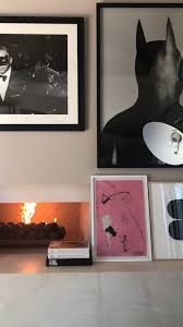 Kourtney kardashian home office in calabasas features plenty of pop culture artwork and a pair of elton john's shoes. The Key To Hanging Art Poosh